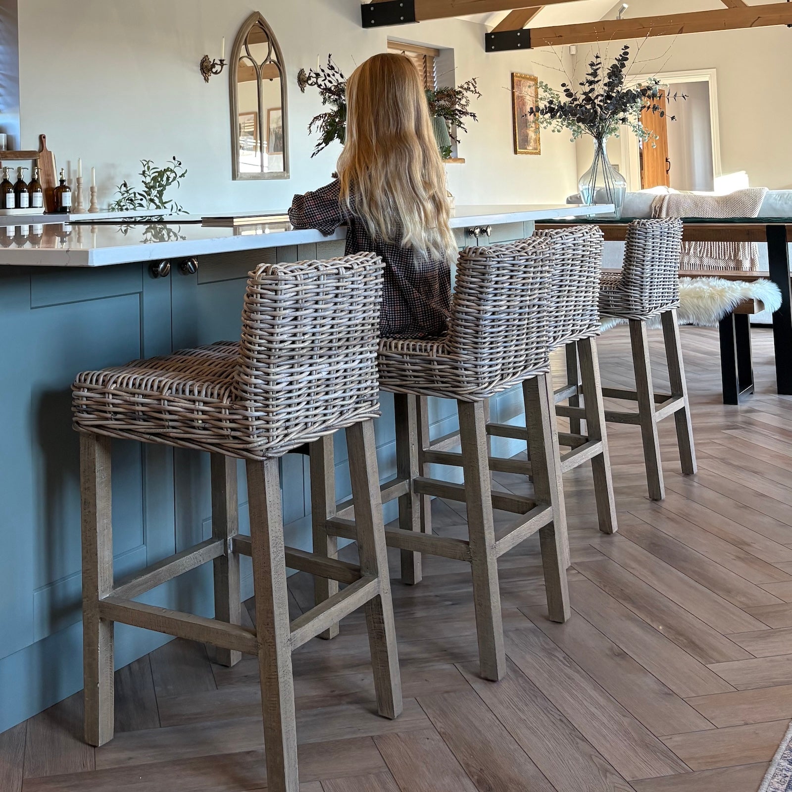 four Lola stools in granary barn with small girl