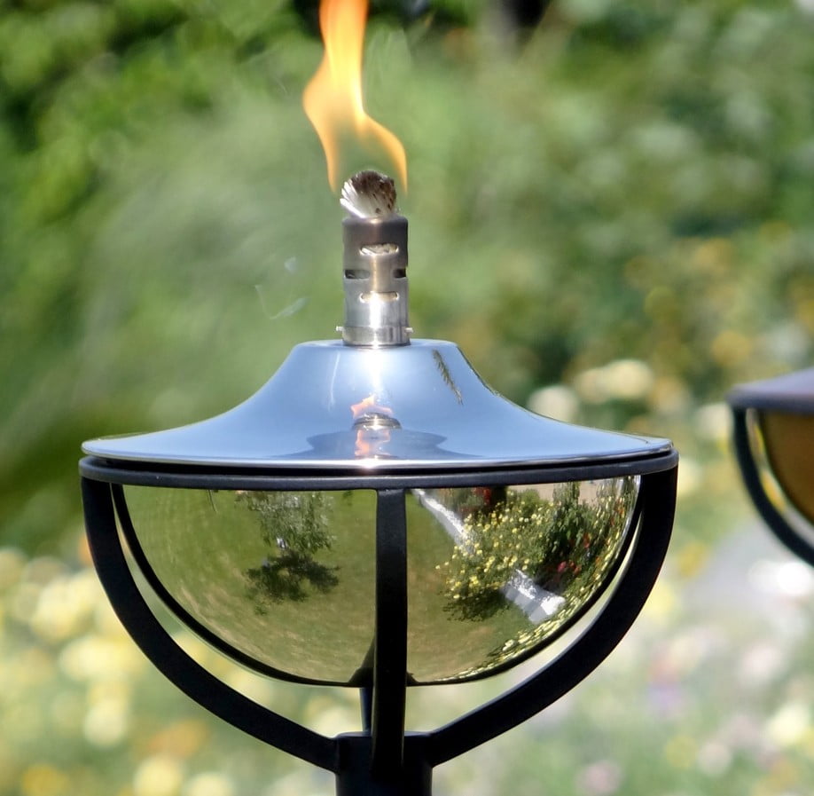 Tall silver oil torch