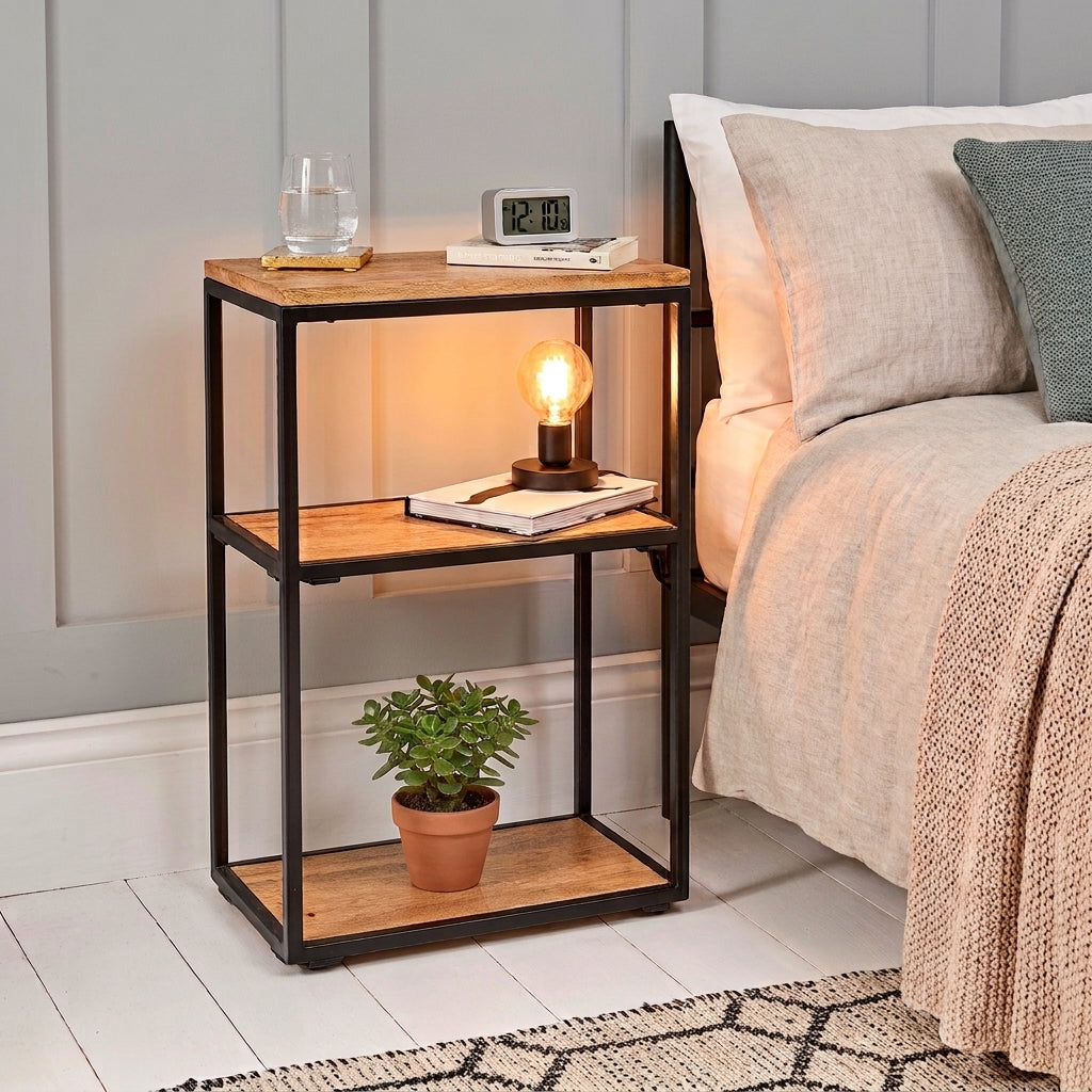 three shelf bedside table in light airy bedroom with white floor