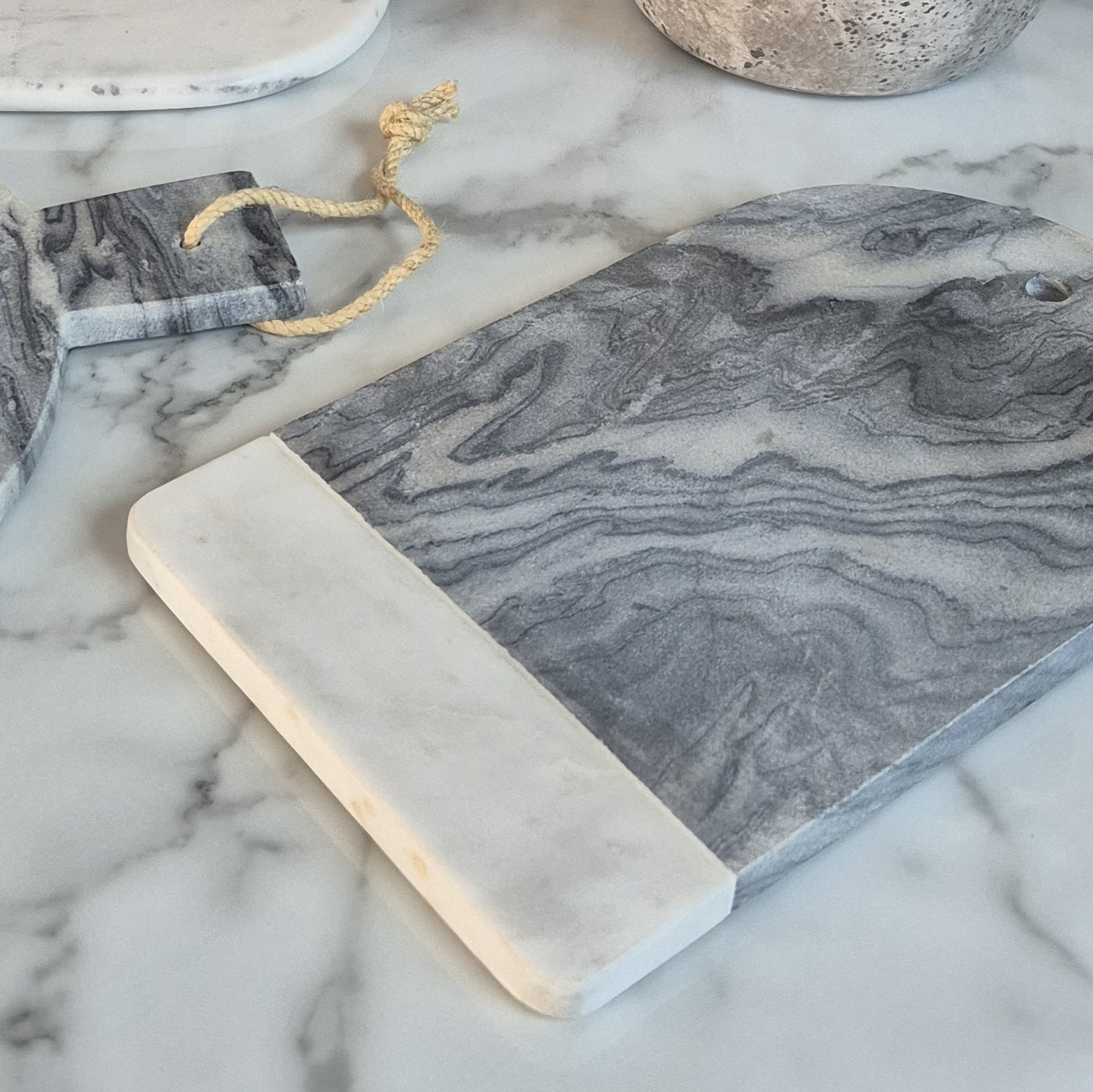 detailed photo of marble serving board in kitchen