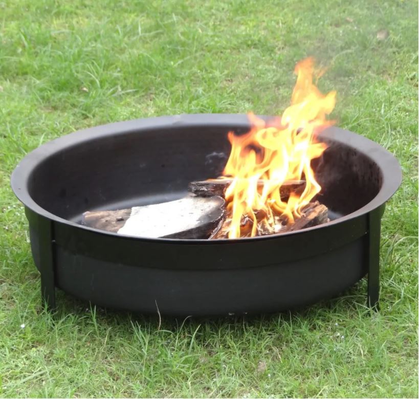 Portable fire pit black in garden
