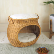 Wicker cat basket with cushion and cat bowl