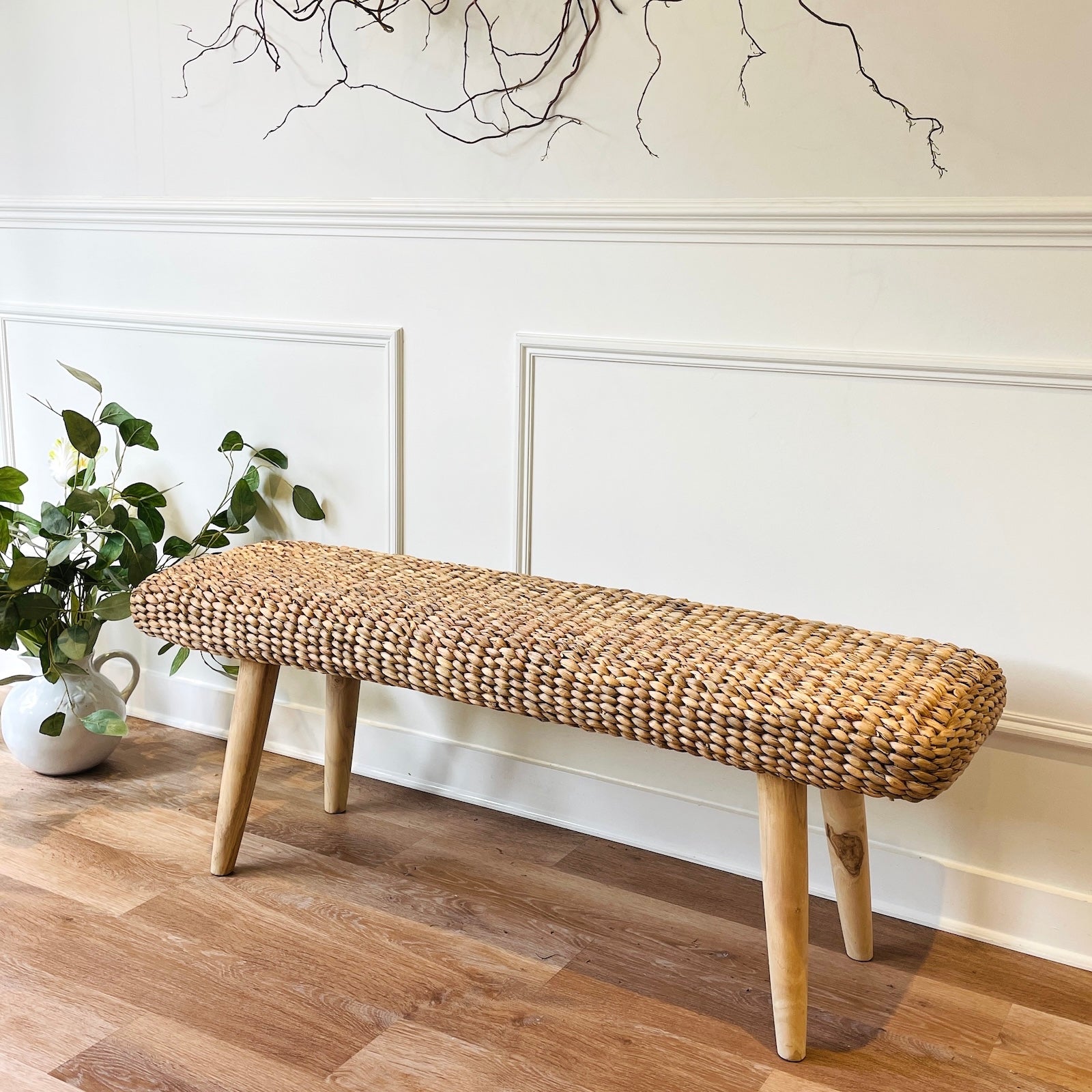 wicker hallway bench in hallway one wooden floor