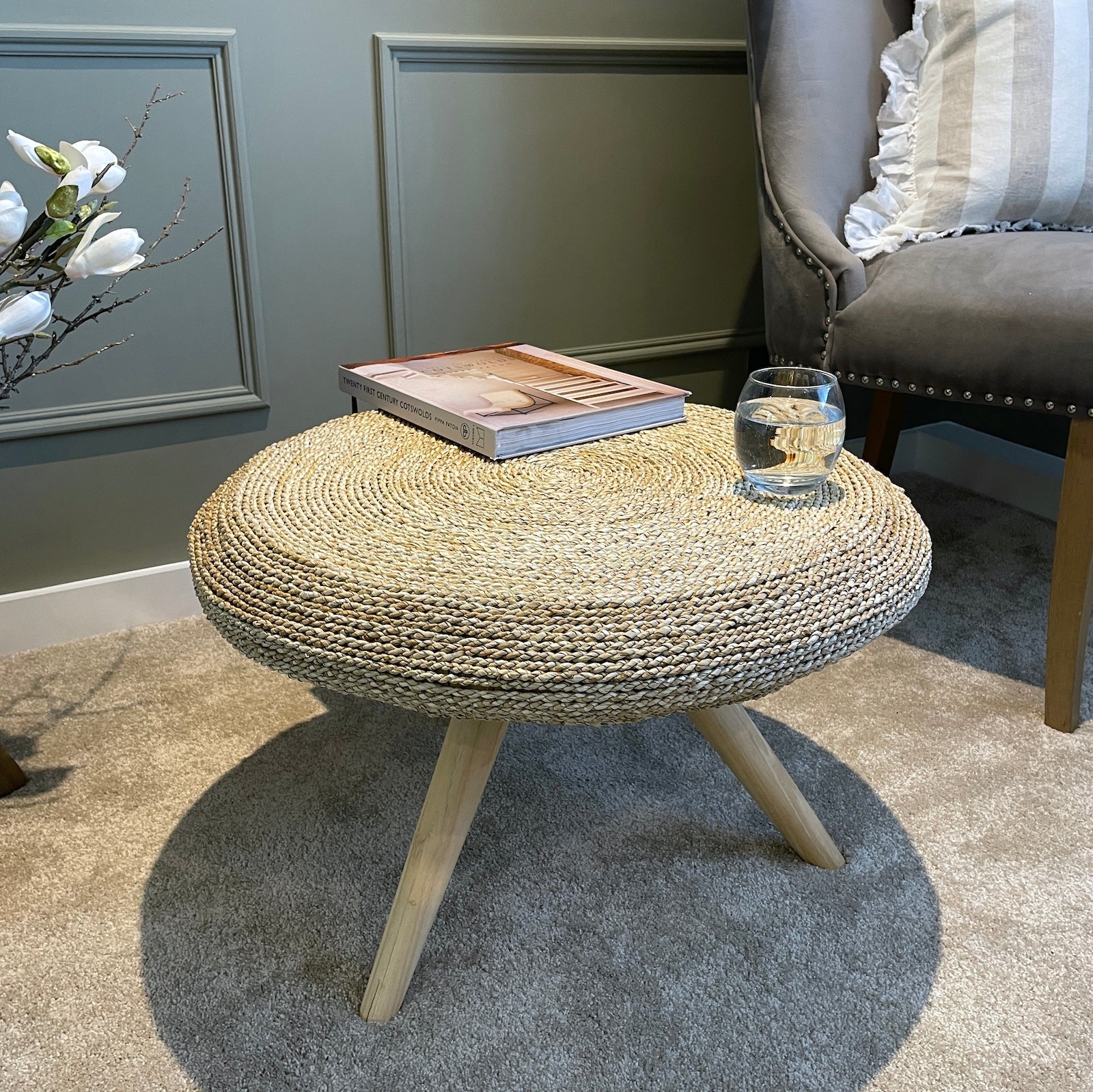 Seagrass coffee table round in living room with chair