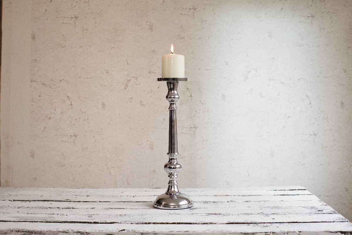 Tall silver candlestick