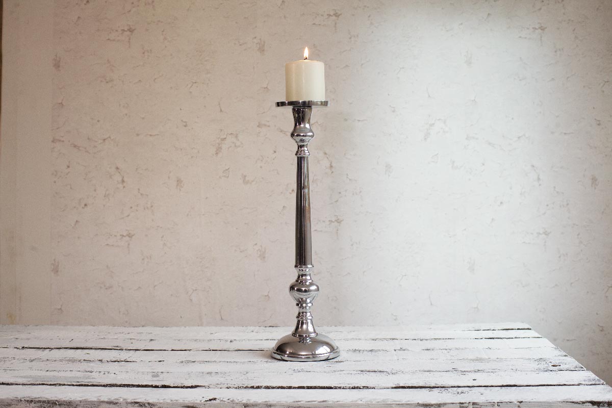 Large indoor silver candlestick