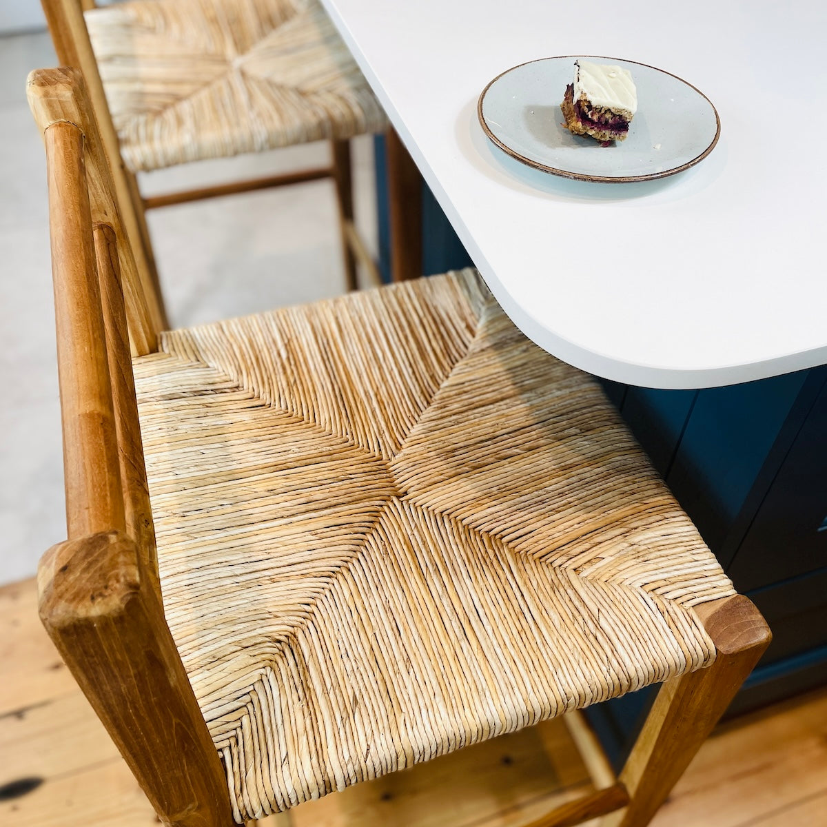 Wicker kitchen stool at island