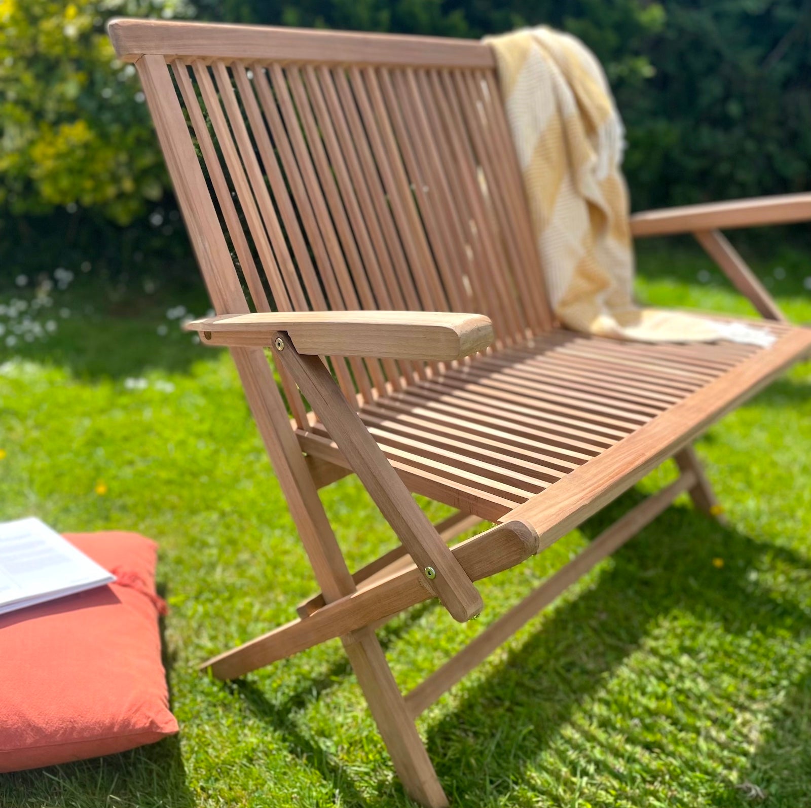 Folding Garden Bench with Arms in Garden