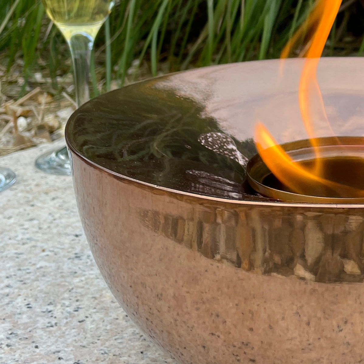 Detailed shot of metal oil burner in garden