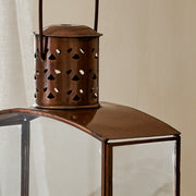Close up of chimney of antique brass lantern