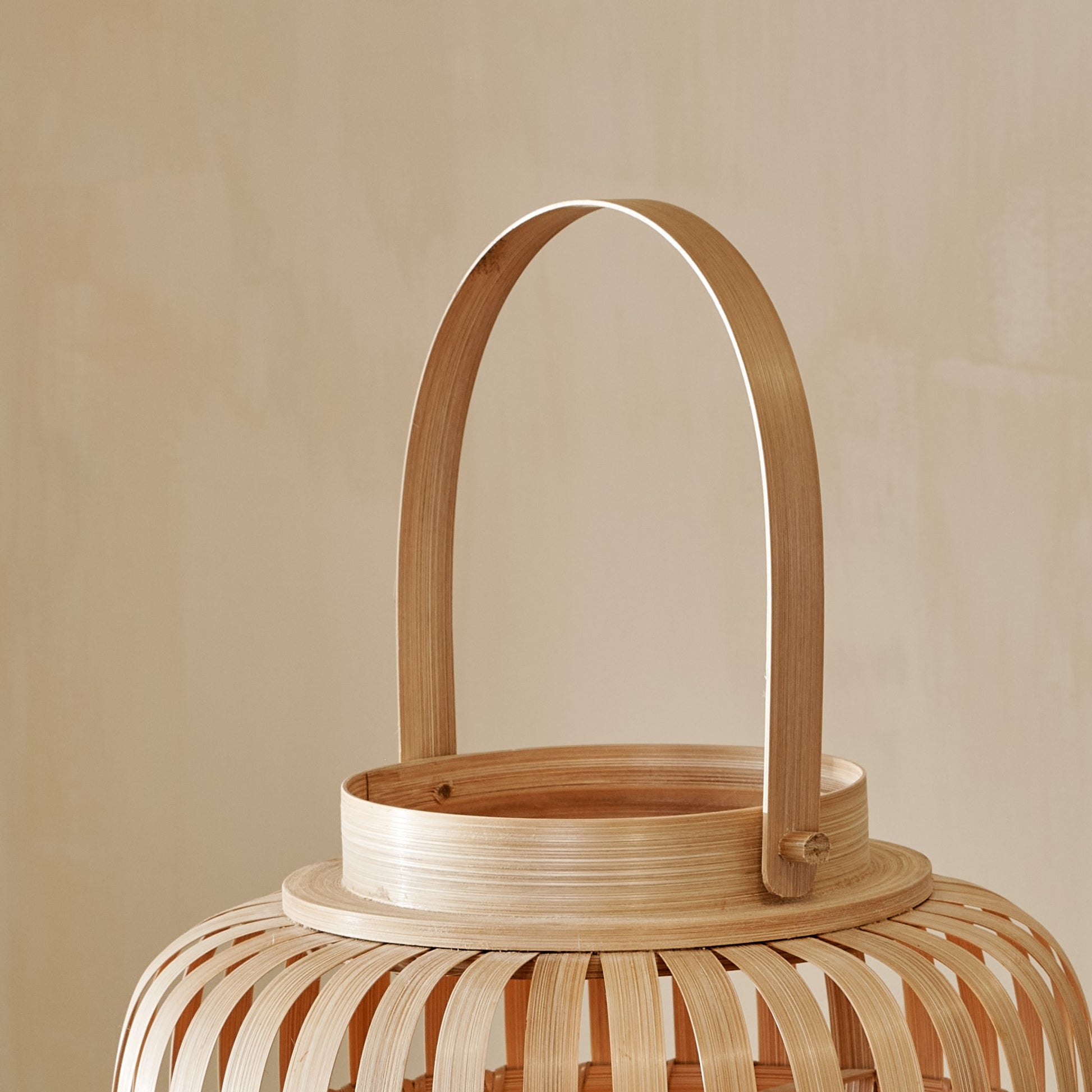 Close up of handle of Natural Bamboo Hurricane Lantern
