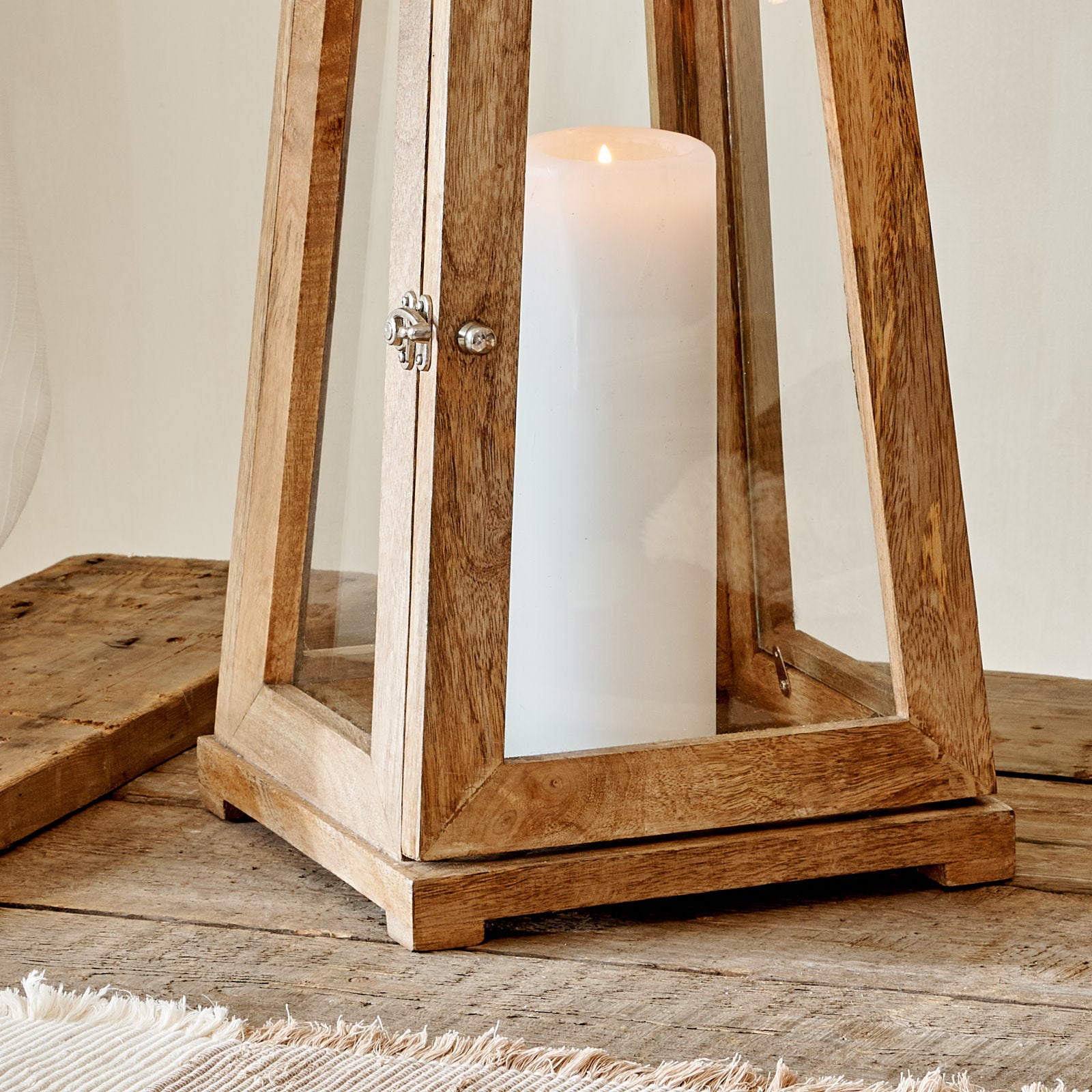 Close up of wooden Sidmouth lantern on wooden table