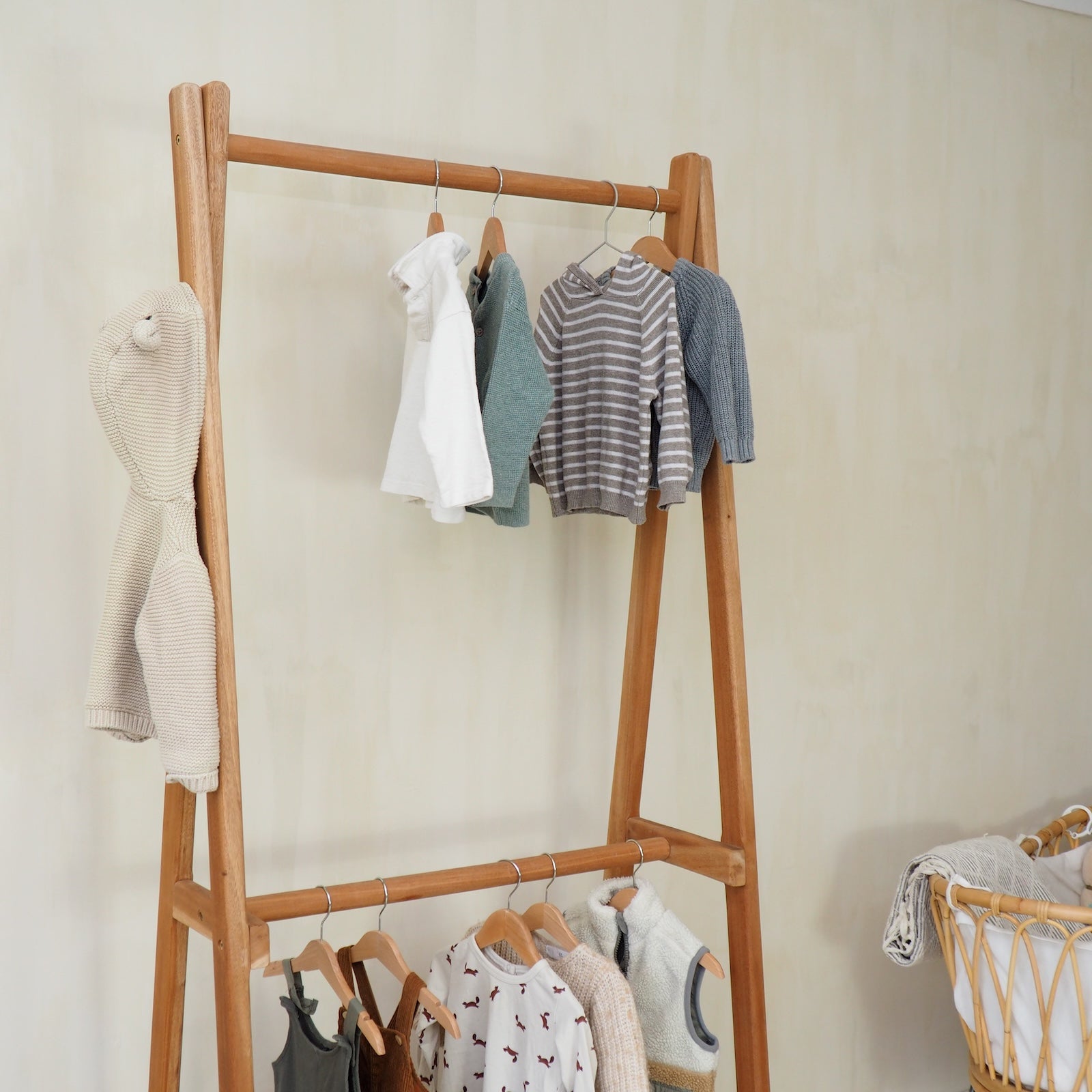 children's bedroom hanging rail with clothes