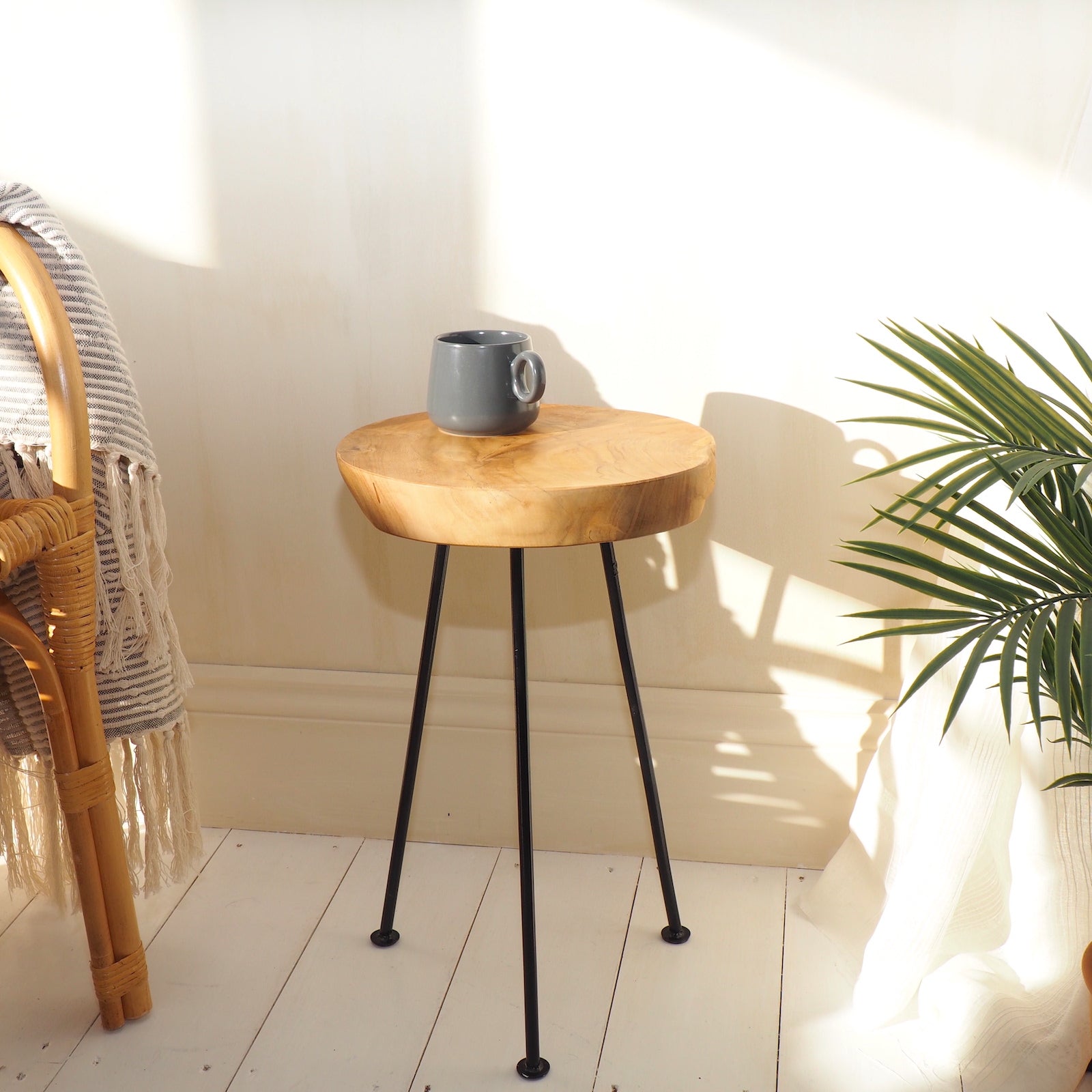Rustic wood coffee table with mug
