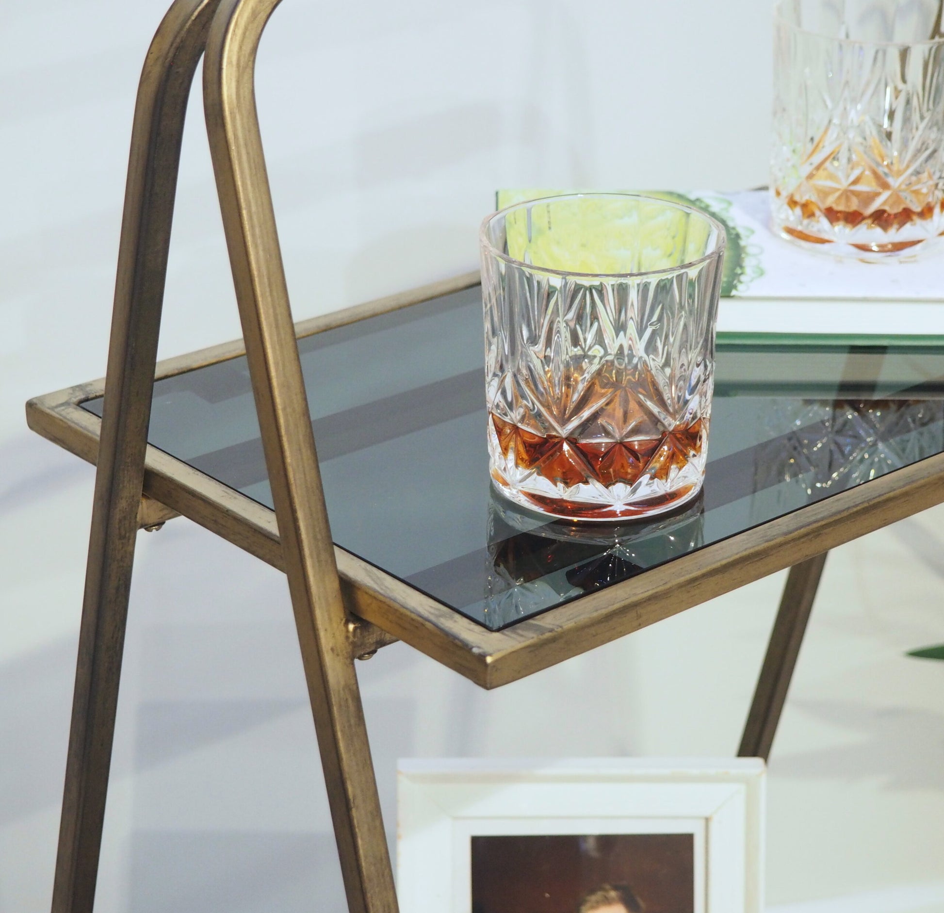 Close Up of Elegant Brass Shelving Unit