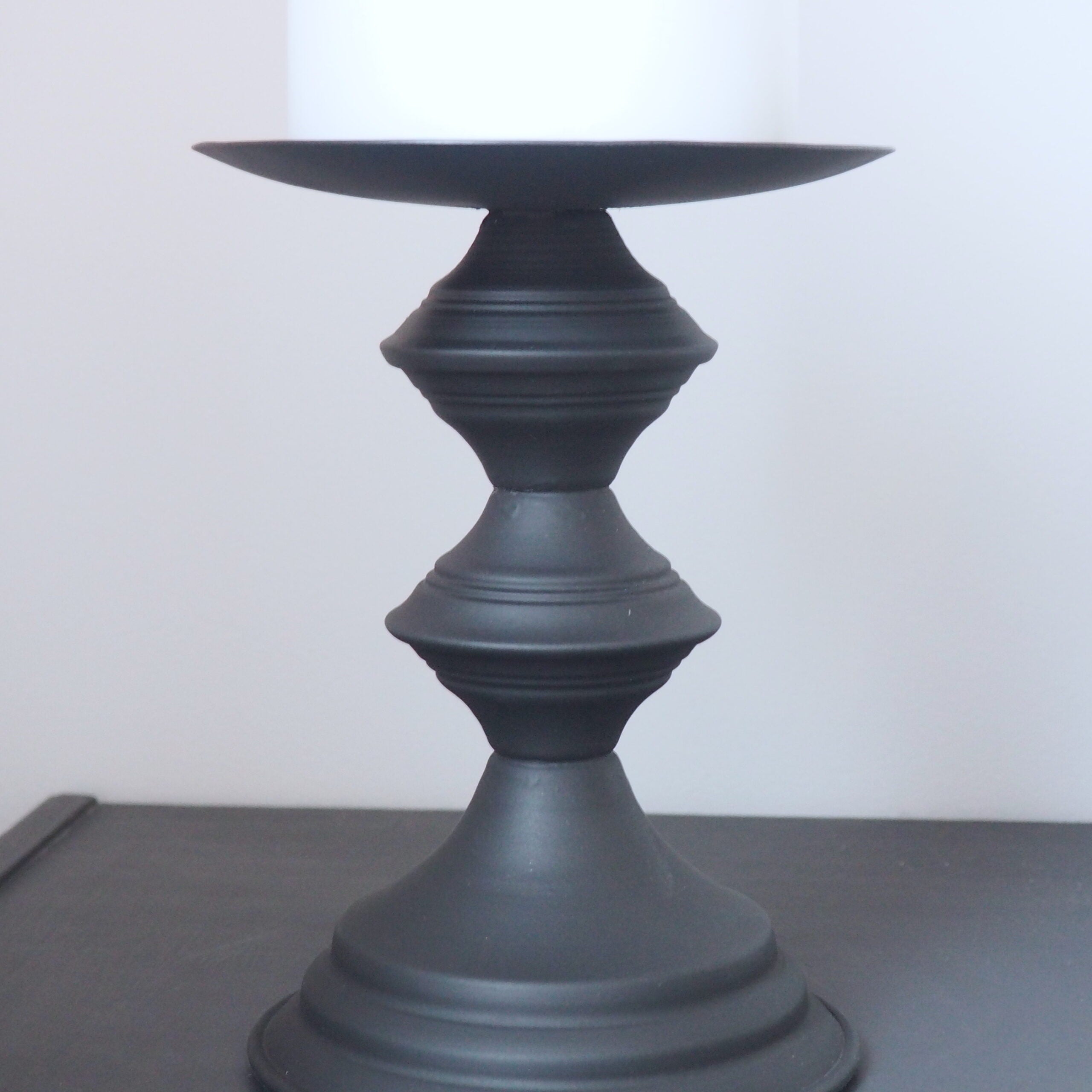 Black metal pillar candlestick