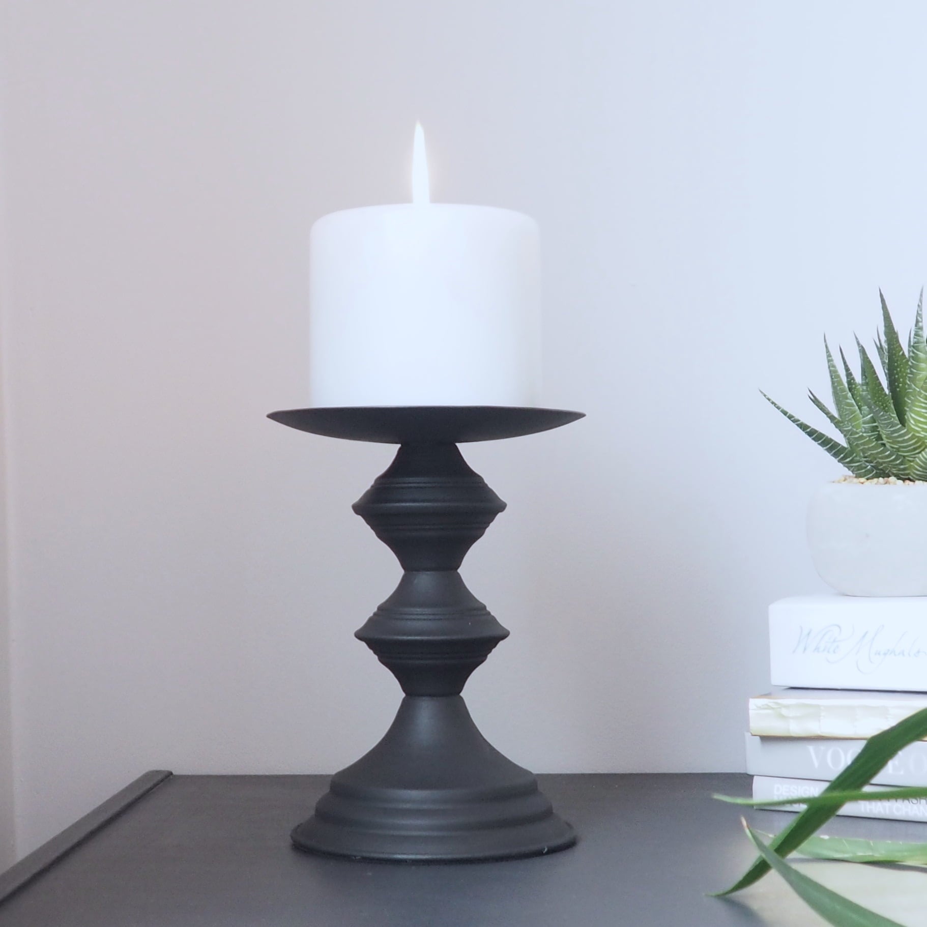 Black metal candle holders
