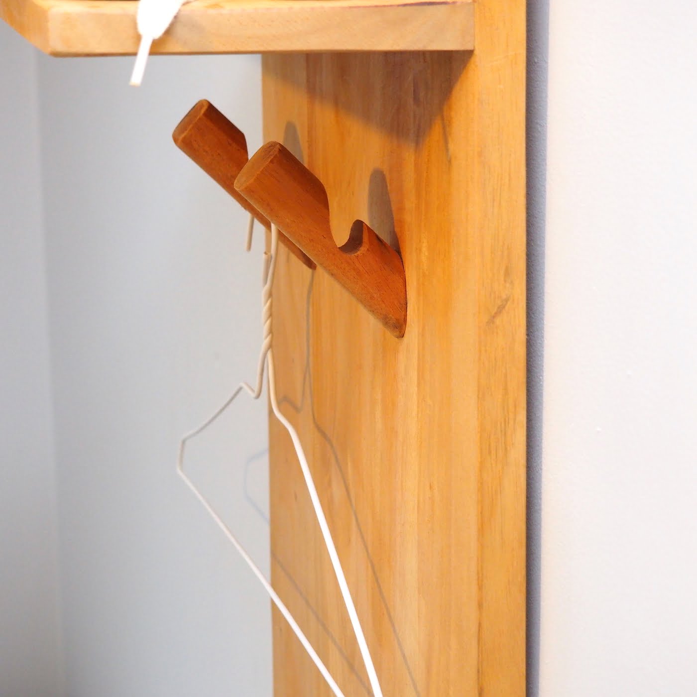 Wall mounted coat rack