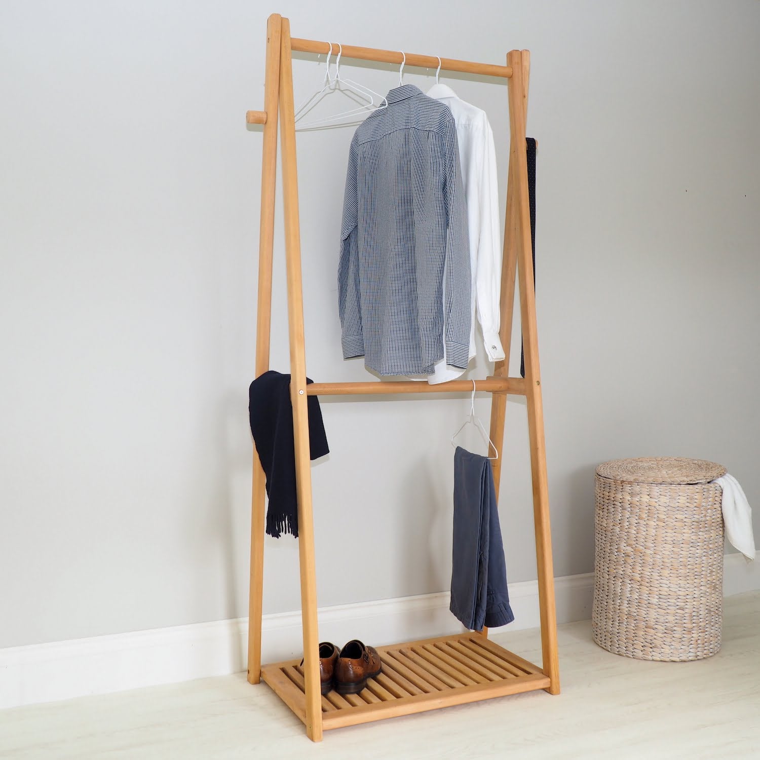 Double Wooden Clothes Rail  in bedroom with Clothes and Basket