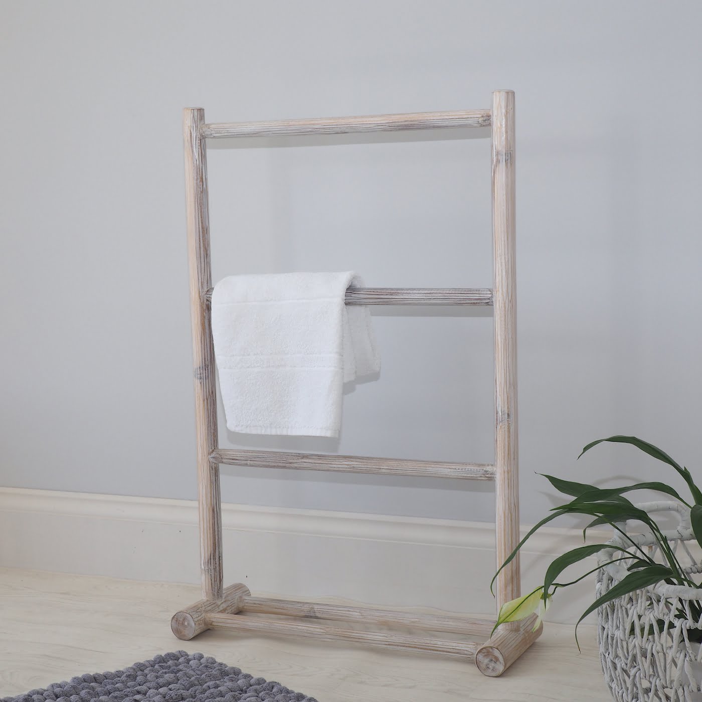 Wooden towel rack with towel