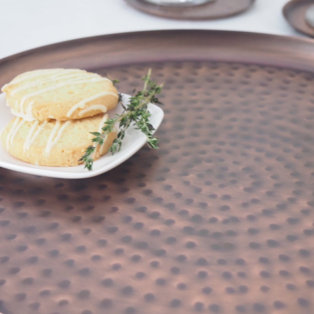 Round copper drinks tray