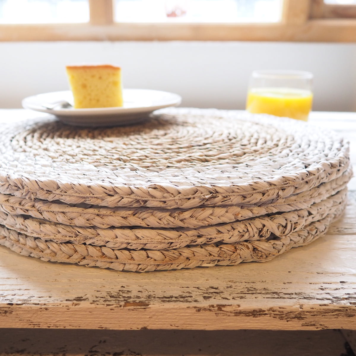 Stacked set of 4 Wicker Drink Coasters