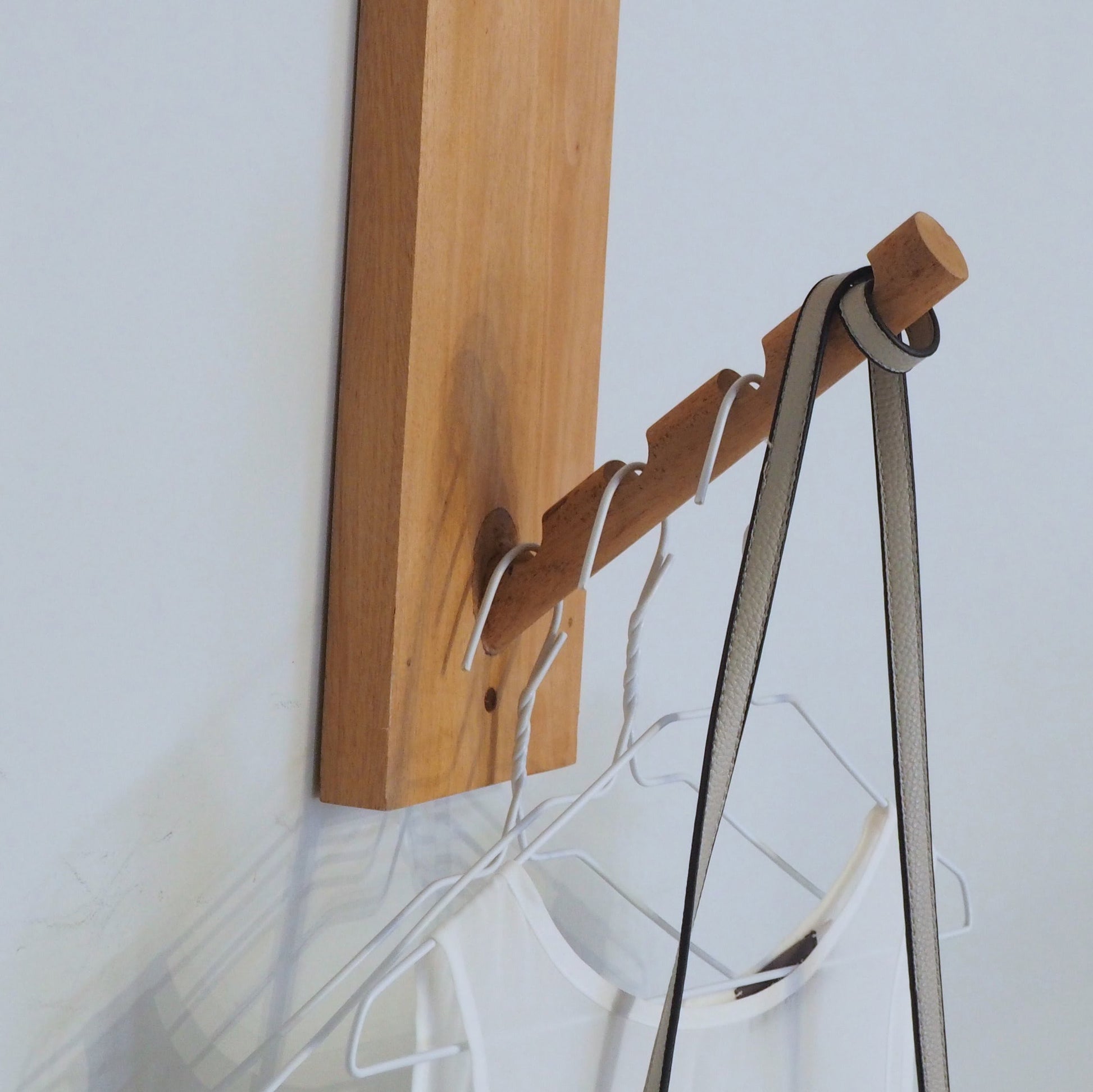 Wall mounted coat rack vertical