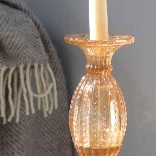 Tall glass candlestick indoor