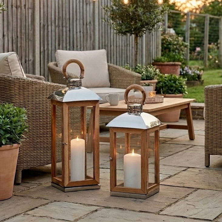 Two lanterns in a garden setting
