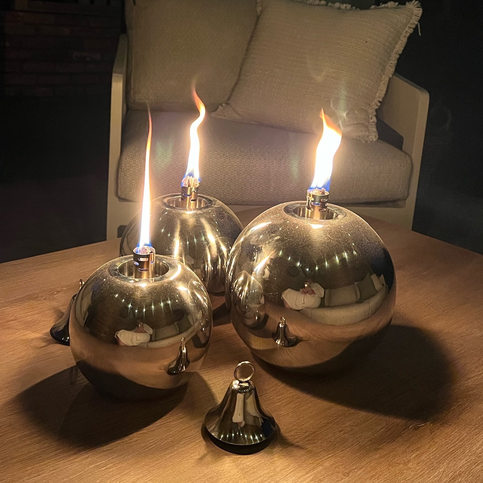 Garden oil lamps round silver on garden table