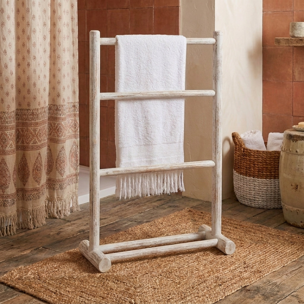 white wooden bathroom towel rail freestanding in boho style bathroom with moroccan curtain