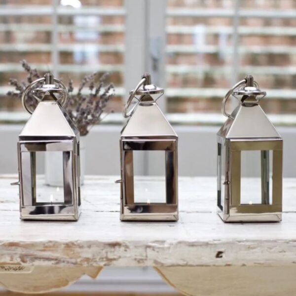 Set of 3 small Silver Metal tealight Lanterns by window