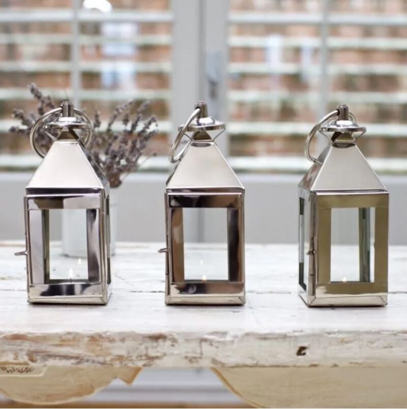 Set of 3 small Silver Metal tealight Lanterns by window