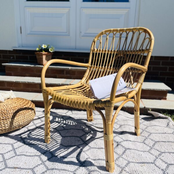 Rattan garden chair on patio