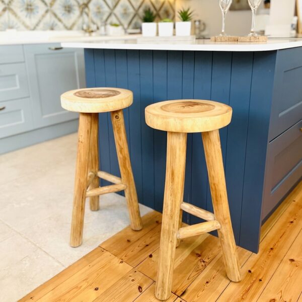wooden kitchen stools at navy kitchen island