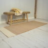 Natural Hallway Runner on white floor with seagrass bench behind