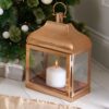 Small rose gold metal candle holder indoor