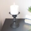 Small black metal candlestick