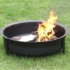 Portable fire pit black in garden