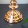 Tall copper candle holder