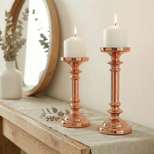 Rose Gold Candleholder on sideboard with mirror and vase