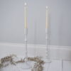 Tall white metal candlestick