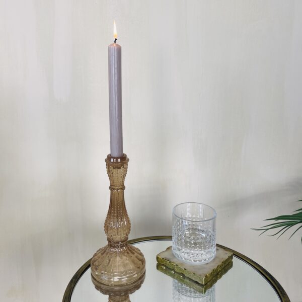 Pink Glass Candle Holder on Brass Table