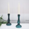 Tall green glass candlestick