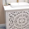 close up of white bathroom sink unit