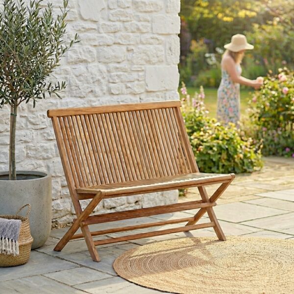 garden folding bench on patio with lady in garden