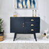 Navy blue sideboard on wooden floor with rug