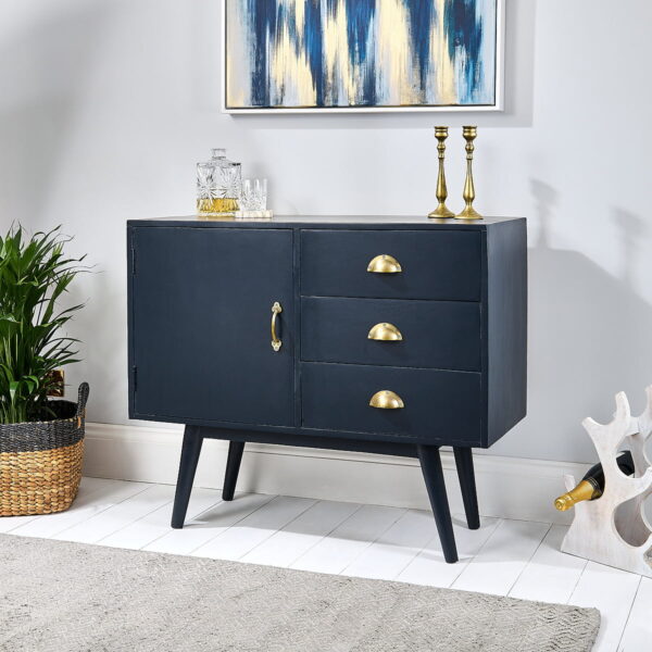 Navy blue sideboard on white wooden floor with rug, wine rack and plant
