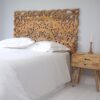 Carved Wooden Headboard on Bed and Cabinet