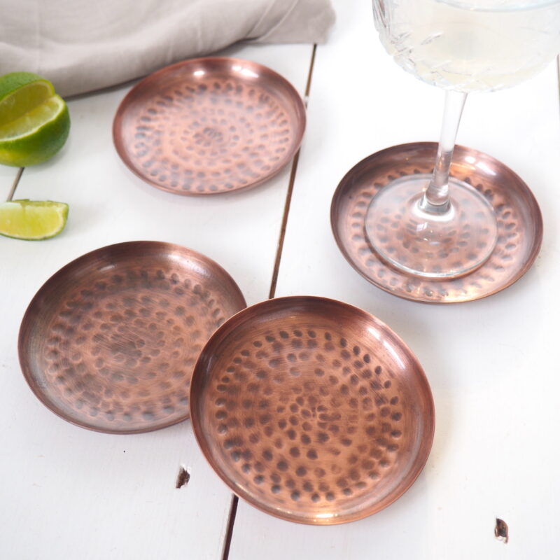 Aged copper drinks coasters set 4 with drinking glass
